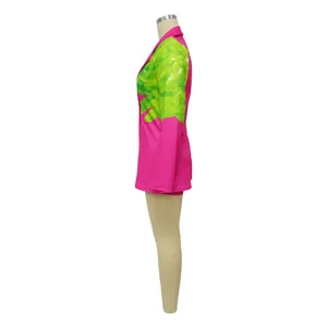 Side profile detail of fashionable pink and lime green printed blazer and shorts suit set