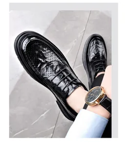 Macro view of black business casual shoes featuring breathable hollow design and thick sole