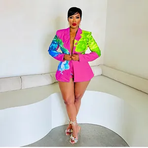 Fashionable pink blazer and shorts set with vibrant floral prints for women