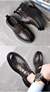 Close-up of brown perforated leather shoes showing breathable hollow design detail