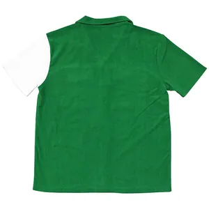 Back view of green heavy corduroy short sleeve shirt with white contrast sleeve
