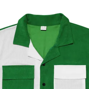 Close-up of a men's color-block green and white corduroy shirt showing heavy texture