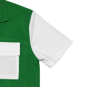 Detailed view of heavy corduroy fabric texture on green and white workwear shirt