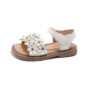 Elegant white girls sandals with delicate flower decorations and soft soles for summer