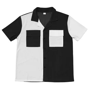 Front view of black and white color-block corduroy short sleeve men's work shirt