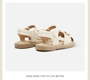 Rear view of elegant cream toddler girl leather sandals with a cute bow detail