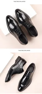 Detail view of black genuine leather brogue shoes with embossed crocodile texture