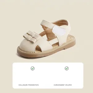 Minimalist beige toddler girl sandals with cute bow and convenient velcro strap closure