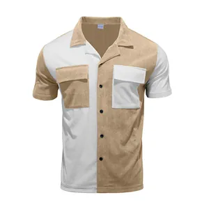 Detail showing corduroy texture and color-block design of a vintage men's short sleeve shirt