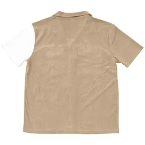 Back view of a heavyweight men's corduroy short sleeve shirt in khaki and white color-block.