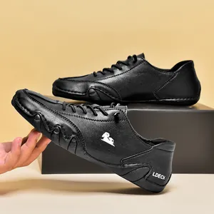 Zapatos casuales de cuero negro para hombre con suela de pulpo y logo