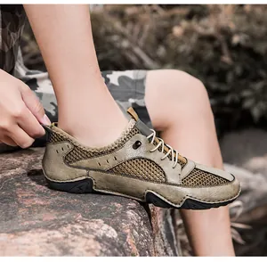 Gedetailleerd zijaanzicht van ademende leren mesh casual herensportschoenen buiten
