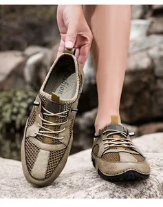 Ademende herenschoenen van leer en mesh voor casual gebruik met handgestikte details
