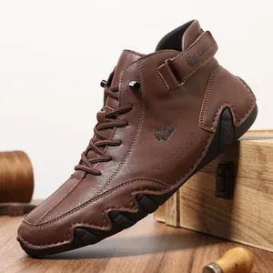 Men's brown high-top leather Martin boots featuring a unique octopus-style rubber sole