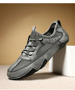 Grijze leren vrijetijdssneakers voor heren met ademend mesh en unieke octopus zool