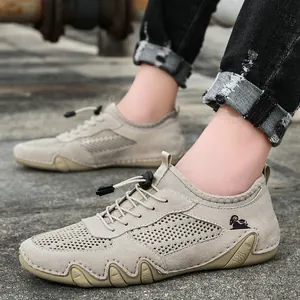 Atmungsaktive Herren-Mesh-Sneaker mit Oktopus-Sohle und Leder-Patchwork-Details.