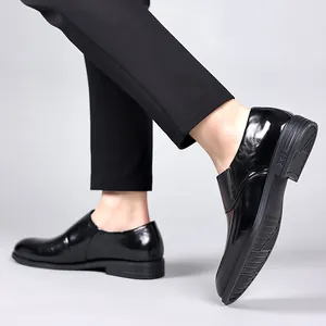 Elegant men's black patent leather slip-on dress shoes for formal business wear
