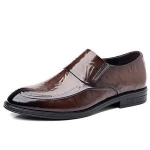 Elegant dark brown leather slip-on dress shoes for men featuring a burnished toe design.