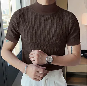 Close-up of men's brown short-sleeved mock neck knit shirt with textured wave pattern