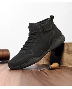 Bottines Martin noires pour hommes, design semelle poulpe, style extérieur décontracté.