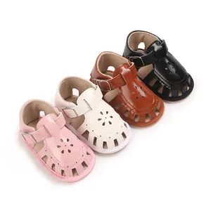 Detail view of soft sole baby girl sandals in pink, white, brown, and black color options.