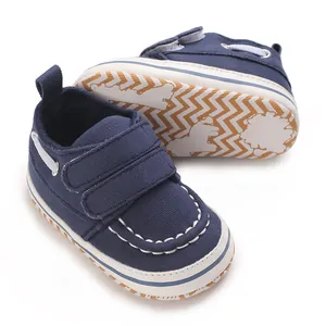 Chaussures de marche en toile bleu marine pour bébé avec brides velcro et surpiqûres