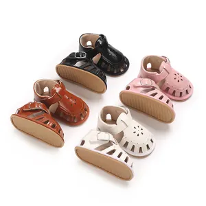 Soft sole baby girl sandals in multiple colors featuring a hollow flower design.