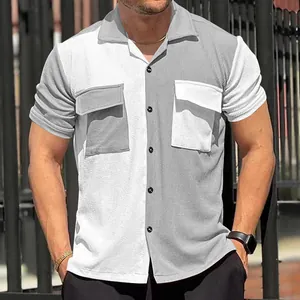 Close-up of men's stylish color-blocked waffle knit short sleeve button-down casual shirt