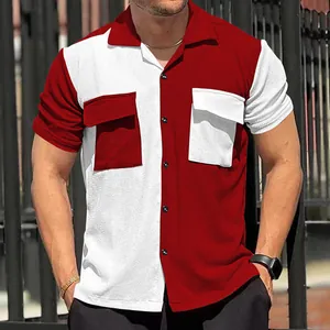 Detail of men's red and white color-block short sleeve shirt with chest pockets