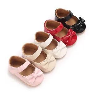 Selection of baby girls patent leather bow princess shoes displayed in five distinct colors