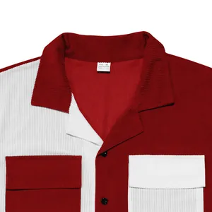 Close-up of red and white color-block corduroy men's shirt showing fine collar detail