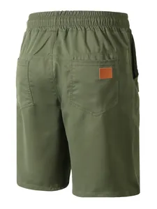 Back view of men's olive green casual shorts showing elastic waist and patch pockets