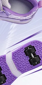 Close-up detail of purple kids' roller shoes with durable four-wheel sole design