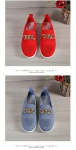 Detailed view of breathable mesh loafers in red and blue with elegant gold chain accents.