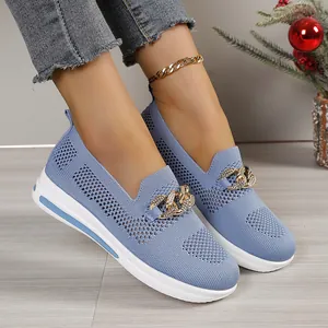 Elegant blue breathable fly-knit women's casual shoes featuring a decorative gold chain