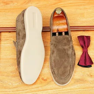 Elegant brown suede loafers for men featuring soft breathable sole and classic slip-on design