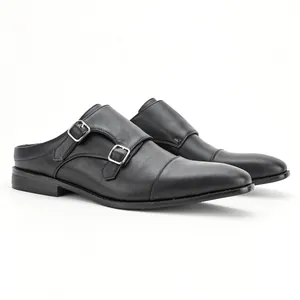 Vue détaillée de mules de bureau en cuir noir pour hommes avec doubles boucles monk strap