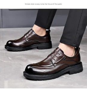 Detailed view of breathable brown leather business casual shoes with laser-cut holes