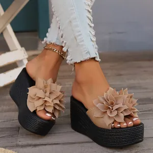 Stylish outdoor platform wedge sandals with large beige fabric flower detail for summer