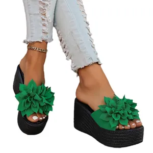 Stylish green wedge platform sandals featuring a large 3D flower decoration for women