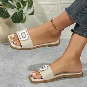 Elegant off-white square toe flat sandals for women with stylish buckle detail for summer