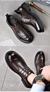 Close-up of brown perforated leather shoes showing breathable texture and laces