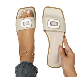 Elegant beige square-toe flat slides with decorative rhinestone buckle for women