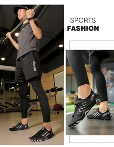 Close-up of black non-slip water shoes worn by a model in a gym setting