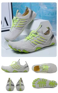 Detailed multi-angle shots of breathable grey and neon green water shoes for hiking