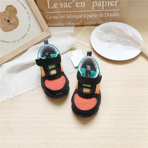 Colorful gradient mesh sneakers for children with black velcro straps and white accents.