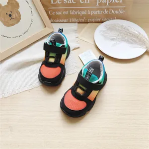 Close-up of lightweight children's gradient mesh sneakers with hook and loop strap
