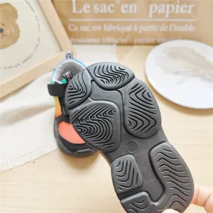 Detailed view of the non-slip rubber outsole of kids' lightweight mesh sneakers