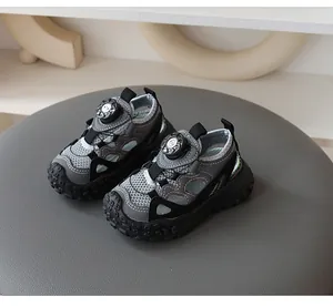Detail showing breathable kids' mesh sandals with a rotating quick-lacing buckle