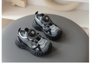 Detail view of breathable grey mesh children's sandals with non-slip soft soles